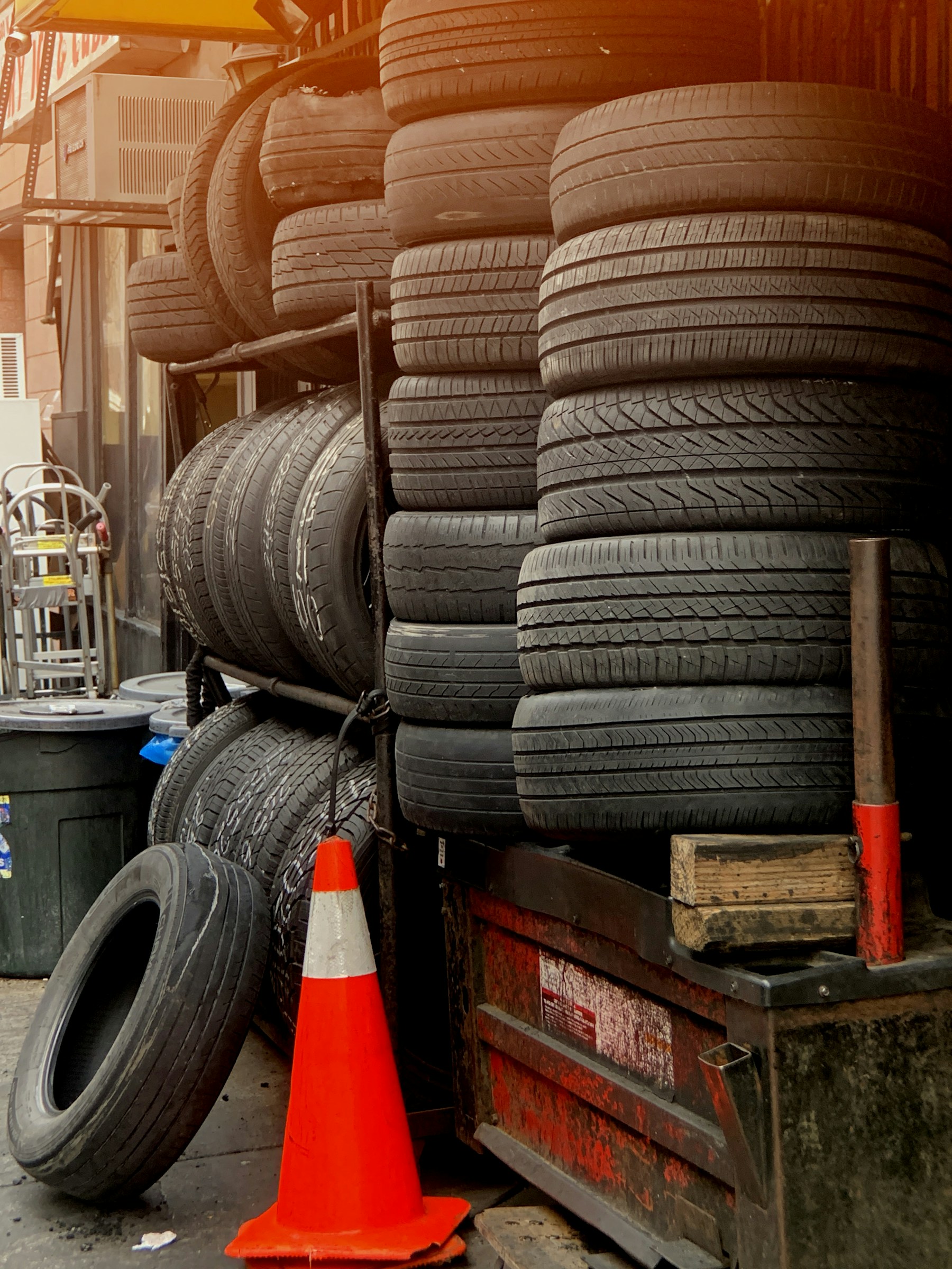 Stacks of tires in an automotive workshop